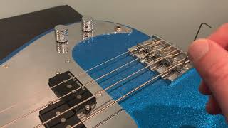 How to adjust string height on a bass guitar [upl. by Lenna]