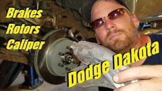 How to replace BRAKES ROTORS and CALIPER DODGE DAKOTA [upl. by Steffin]