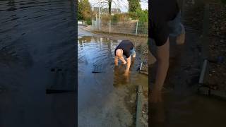 S0142 Unclogging a storm drain on a playing area in Germany shorts [upl. by Tselec]