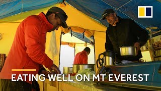 Fresh food and pastries at Everest base camp greet climbers [upl. by Zednanreh]