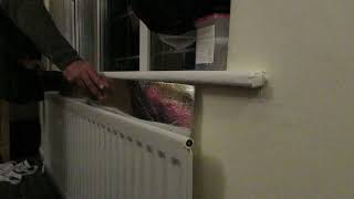 Installing Diall Radiator heat reflector [upl. by Nodnalb]