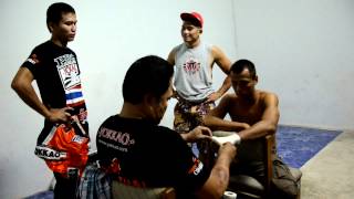 2406 Tying hand wraps to Sittichai Sitsongpeenong sponsored by Yokkao  twitter yokkaoboxing [upl. by Notxam]