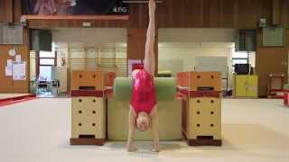 Gymnastics Back handspring with stepout on the beam [upl. by Akilaz]