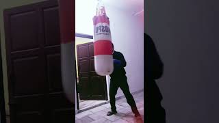 Headbodyhead boxing combo on heavy bag [upl. by Einaffit465]