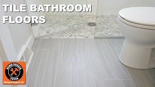 How to Tile a Bathroom FloorNext to Curbless Showers  by Home Repair Tutor [upl. by Lydie]