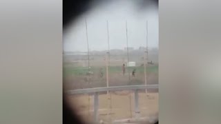 Israeli sniper appears to shoot unarmed Palestinian man in Gaza [upl. by Karisa]