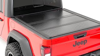 Installing Low Profile Hard Tri Fold Tonneau Cover by Rough Country [upl. by Inoek472]