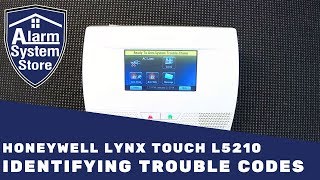 How To Clear Trouble Conditions On Honeywell Lynx L5210  AlarmSystemStore [upl. by Pollak]