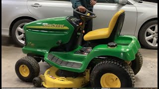 How to install a Mower Deck Belt on a John Deere L110 tractor [upl. by Schaffer296]