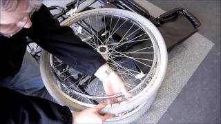 How to Fit a Solid Wheelchair Tyre [upl. by Alfredo573]