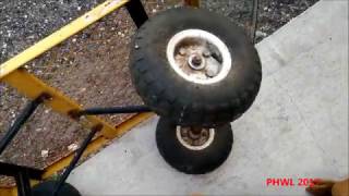 Replacing the wheel bearings from utility cart [upl. by Caralie]