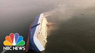 Video Shows Huge Capsized Cargo Ship  NBC News [upl. by Jojo]