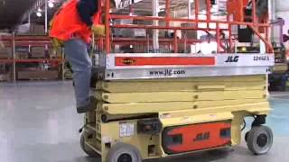 Scissor Aerial Lift Training JLG ES [upl. by Quincy698]