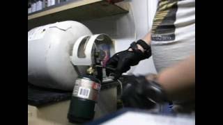 Refilling 1lb Propane Cylinders using the pressure relief valve method nonchill [upl. by Evey]