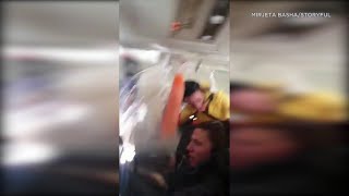 SCARY VIDEO Flight attendant beverage cart smash into ceiling during violent turbulence  ABC7 [upl. by Cutlor]