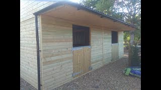 Building a wooden horse stables Stable Build Company [upl. by Stanzel182]