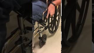 How to LockUnlock a wheelchair [upl. by Chuipek]