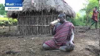 Men in the Bodi Tribe in Ethiopia compete to be crowned fattest man [upl. by Romalda]