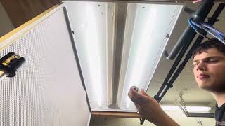 How to change a fluorescent bulb in a Fluorescent drop ceiling troffer fixture [upl. by Anitsua]