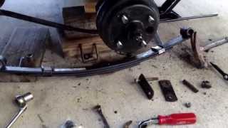 HOW TO REPLACE and UPGRADE REAR HEAVY DUTY LEAF SPRINGS on EZ GO TXT GOLF CART [upl. by Aicinod]