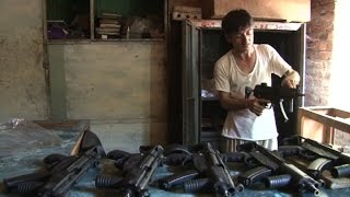 Guns cheaper than smartphones in Pakistani tribal town [upl. by Schaper870]