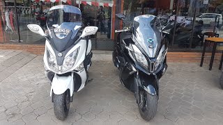 Kymco Downtown 250cc Versus SYM GTS 250cc [upl. by Dleifrag182]