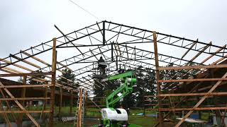 DIY 40 x 60 Pole Barn Build with steel trusses Part 2 Time lapse video pole barn setting trusses [upl. by Jessalyn806]