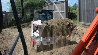 Our Bobcat S70 moving dirt in an extremely tight backyard [upl. by Orlina]