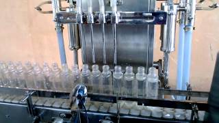 GMP Semi Automatic Four Head Volumetric Liquid Filling Machine [upl. by Onairda]