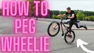 How To Peg Wheelie A Bike Easy way [upl. by Gonyea46]