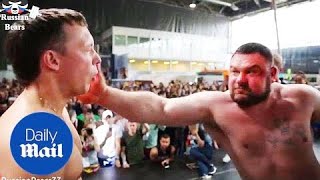 Men aggressively slap each other in Russian strength competition [upl. by Haimehen665]