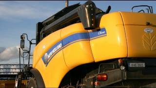 Harvest 2011New Holland CX 5080 McCarthys at the Spring Barley  T6030TM120 [upl. by Sualokcin]