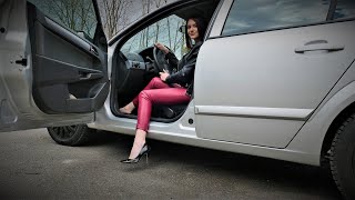 WOMAN DRIVING IN LEATHER OUTFIT AND HIGH HEELS [upl. by Kimberlyn]