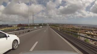 Willemstad Curaçao  Drive over the Queen Juliana Bridge HD 2016 [upl. by Emyaj640]