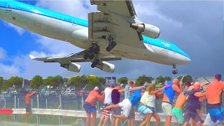 St Maarten unforgettable unique attraction KLM B747 low landing and amazing Jet Blast at Maho beach [upl. by Montague]