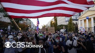 Americans take to the streets after Presidentelect Bidens victory and Trumps loss [upl. by Adnhoj890]