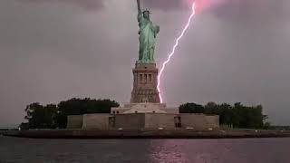 Statue of Liberty lit up by lightning [upl. by Terb]