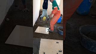 Installing ceramic floor tiles with cement shorts Tileinstallation [upl. by Norrv]