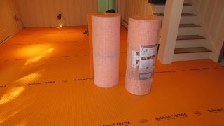 How to tile a large basement floor Part 1 Installing Schluter Ditra [upl. by Busch]