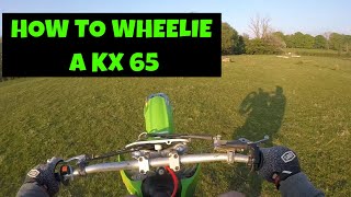 How to wheelie a Kx 65 💪 [upl. by Klemm930]