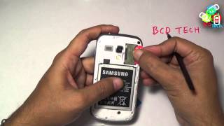 Samsung Galaxy S Duos 2 S7582  How to insert SIM [upl. by Aerdnaed]