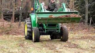 John Deere 4120 tractor doing yard work [upl. by Alyac]