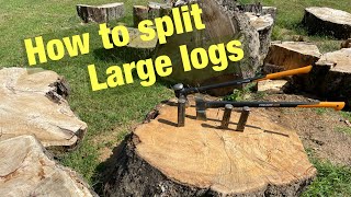 How to split large logs for firewood [upl. by Arehsat304]