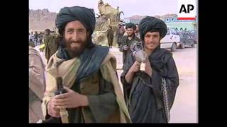 Afghan interim leader makes base in Mullah Omars compound [upl. by Nileuqaj]