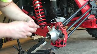 Canam X3 wheel bearing grease  How To [upl. by Akienat]