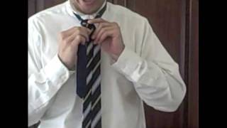 How to Tie a Full Windsor Knot  Art of Manliness [upl. by Aihseym684]