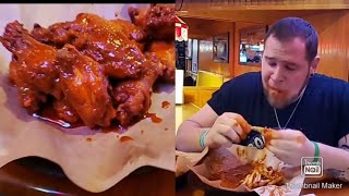 Lets try the hottest hot wing challenge weve ever seen the what the puck challenge edited [upl. by Eiramoj]