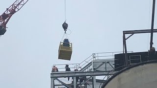 Fastthinking firefighters rescue worker dangling from 120foot silo [upl. by Ativahs603]