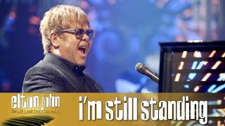 Elton John  Im Still Standing Lyrics [upl. by Lemyt]