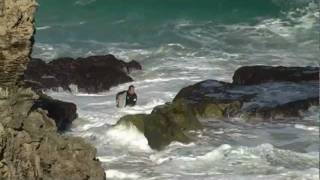 Surfer getting smashed on rocks [upl. by Danzig]